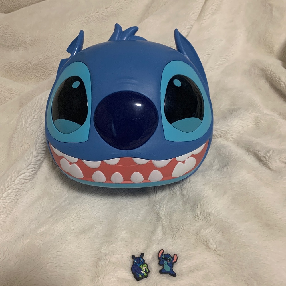 Stitch figurine/ container + 2 crocs charms